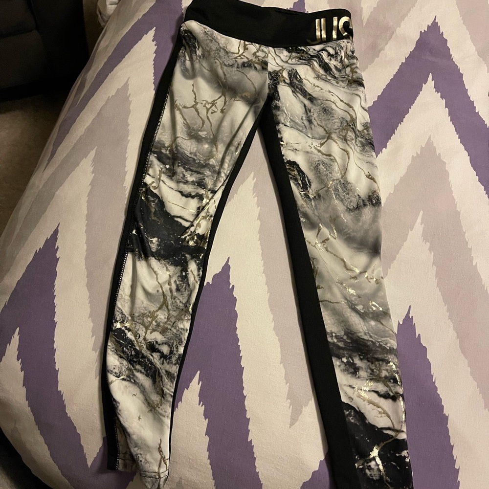 Set of 4 Justice Girls Athletic stretch leggings. Size 8